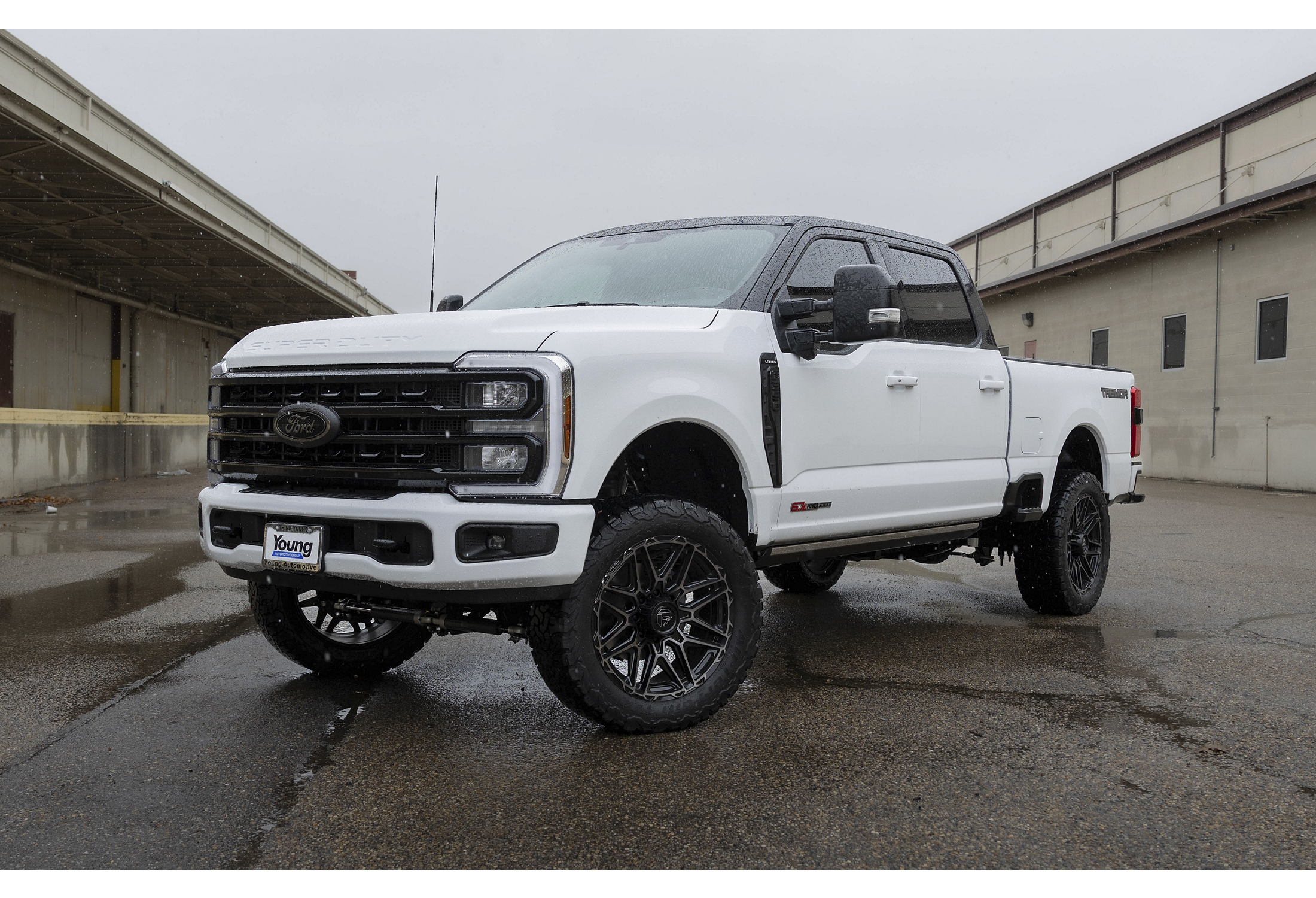White lifted Ford F-250 Super Duty truck
