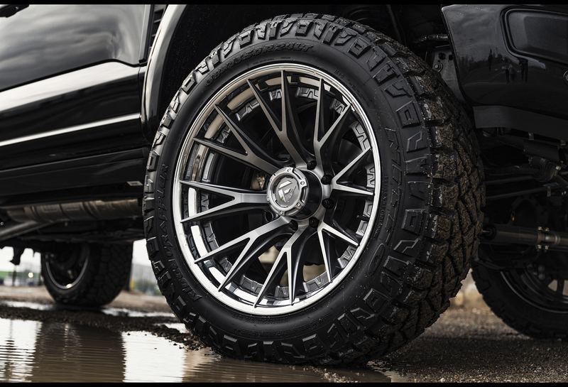 Custom multi-spoke wheel on a lifted truck
