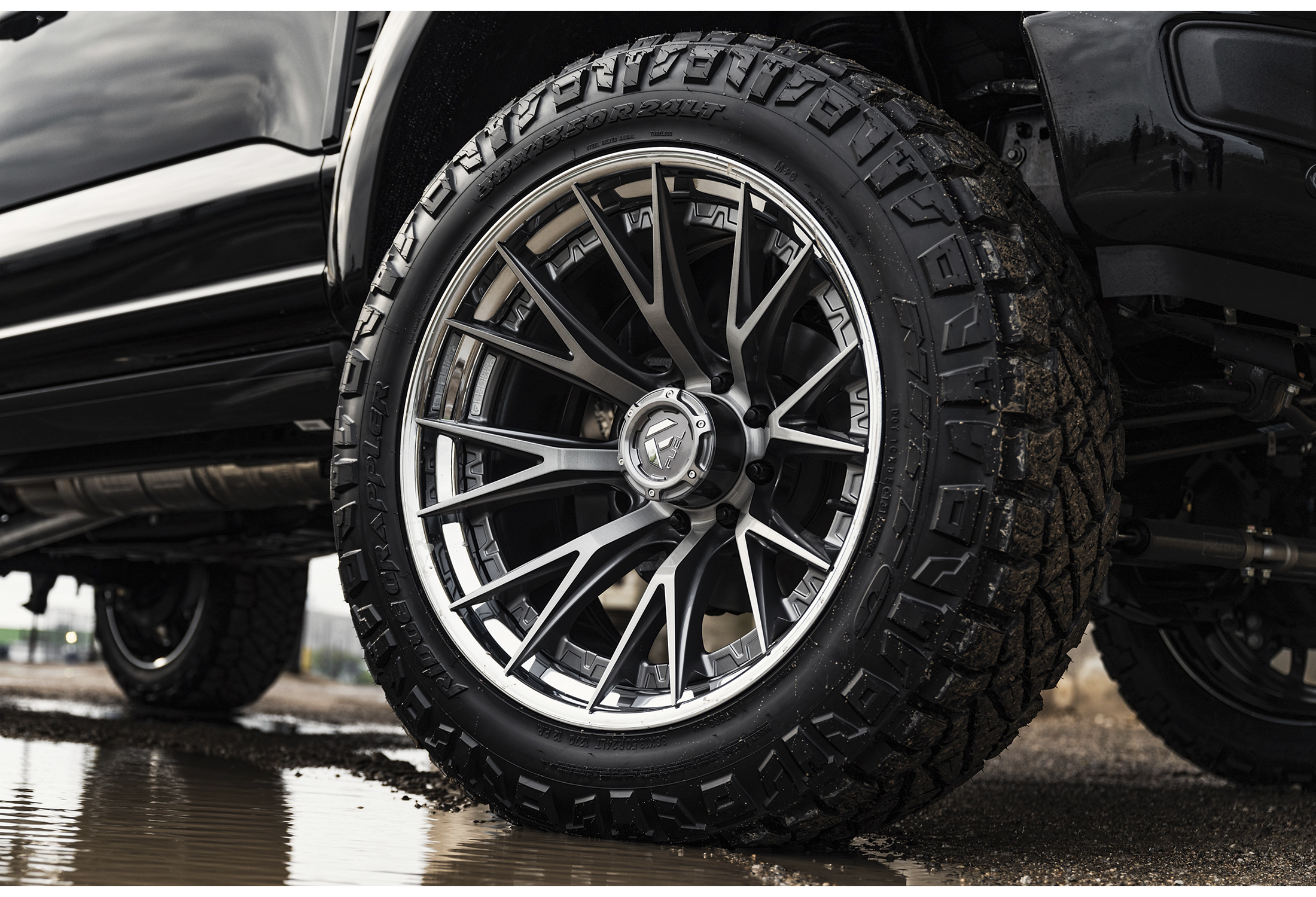 Custom multi-spoke wheel on a lifted truck