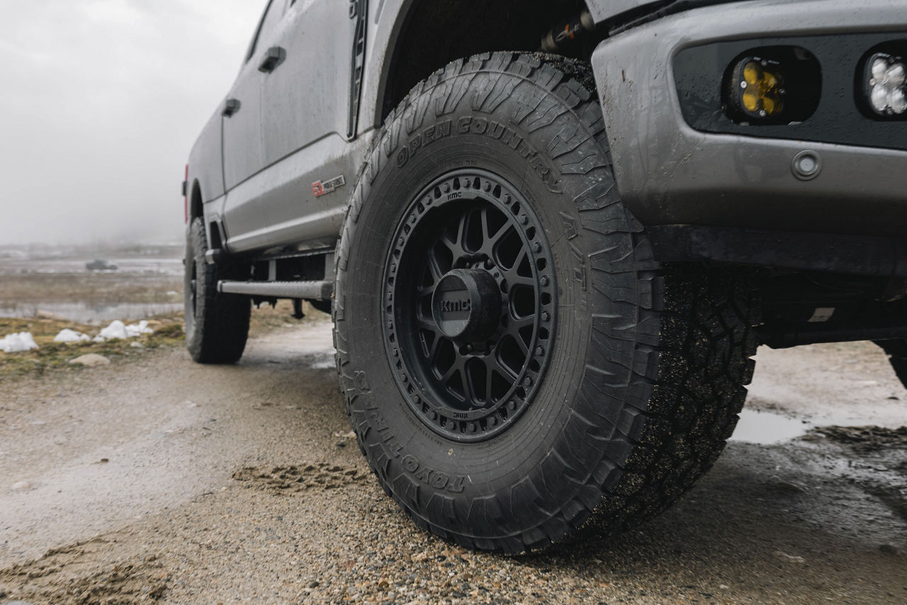 Lifted Ford Super Duty on KMC wheels and Toyo Open Country tires at LR Wheels N Lifts Tampa